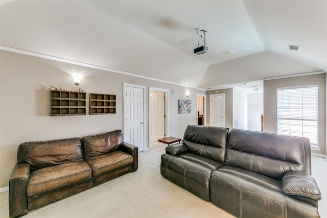 living room featuring light colored carpet and lofted ceiling