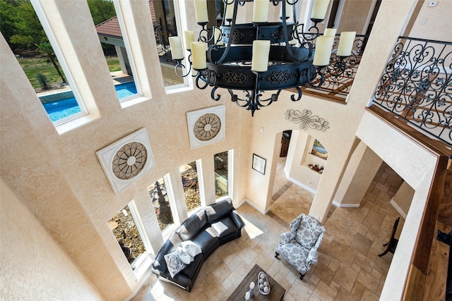 dining room featuring french doors, an inviting chandelier, and crown molding