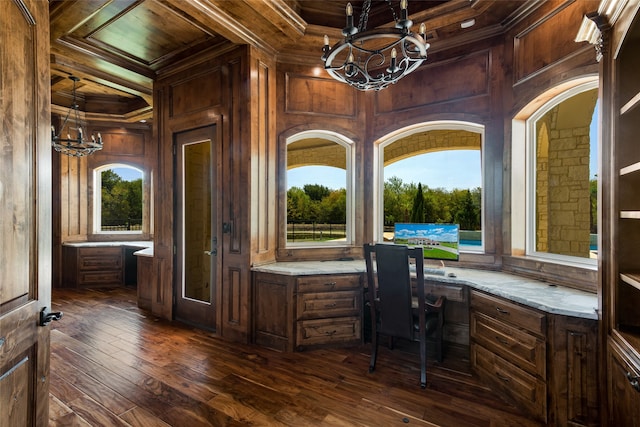 bathroom featuring vanity, crown molding, and tiled bath