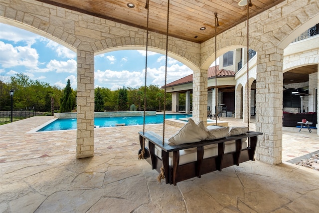 view of pool featuring a patio area