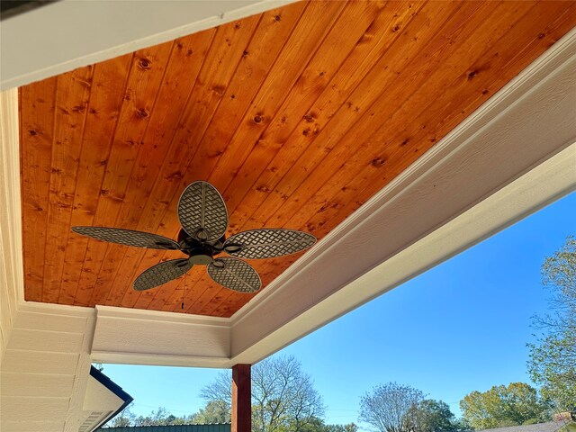 exterior details featuring ceiling fan