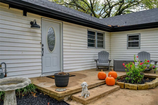 property entrance with a patio area