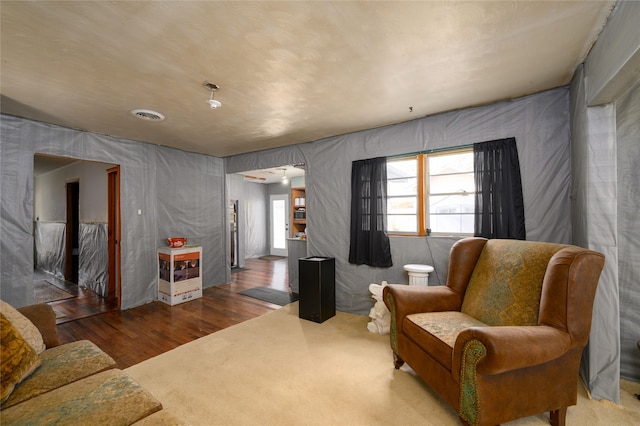 living area featuring hardwood / wood-style floors