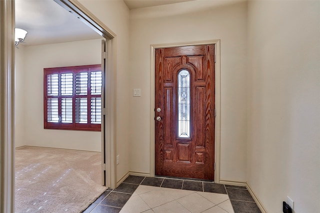 view of tiled foyer entrance