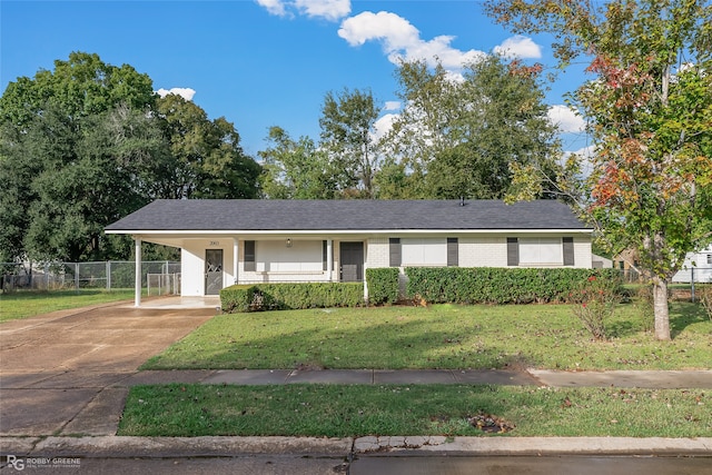 ranch-style house with a front lawn