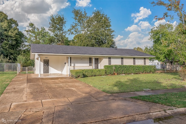 ranch-style home with a front yard