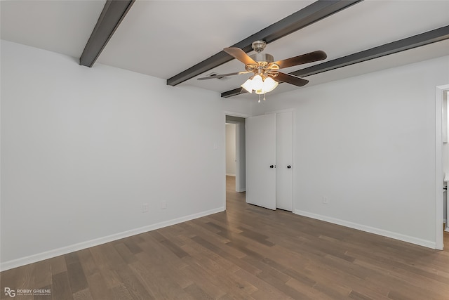 unfurnished room featuring wood-type flooring, ceiling fan, and beam ceiling