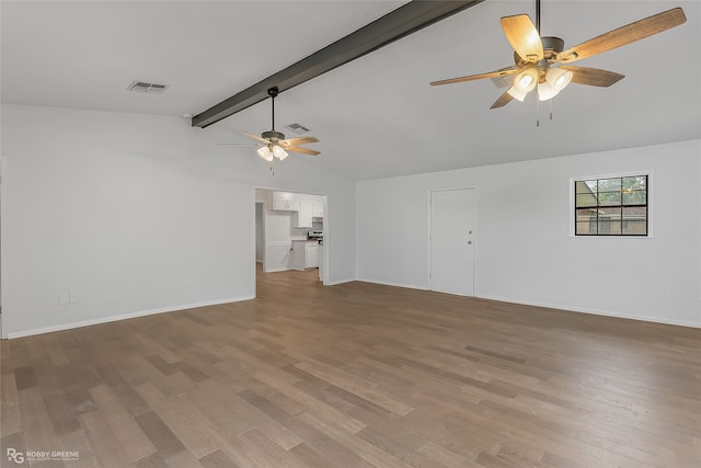 unfurnished living room with lofted ceiling with beams, ceiling fan, and light hardwood / wood-style flooring