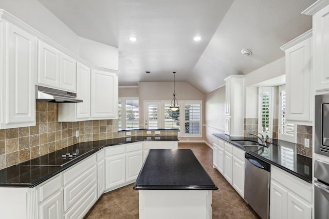 kitchen with white cabinetry, stainless steel dishwasher, and a center island