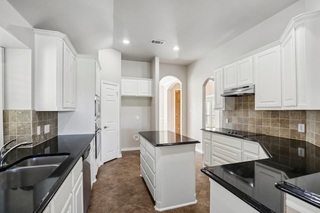 kitchen featuring sink, white cabinetry, black electric stovetop, a kitchen island, and stainless steel dishwasher