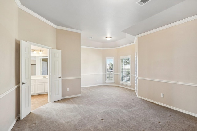 empty room with light carpet and ornamental molding