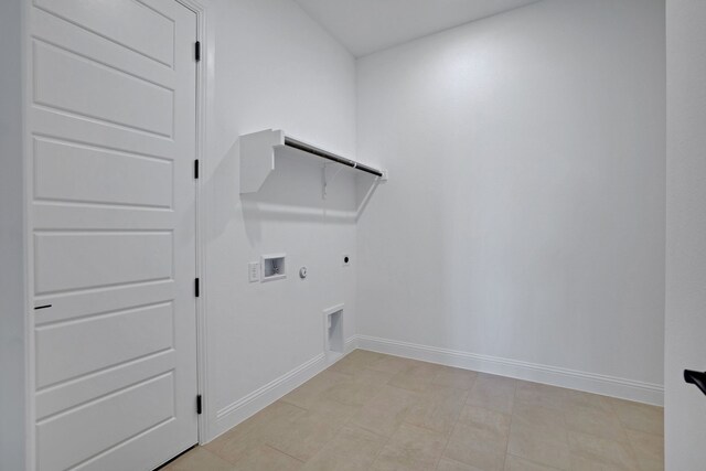 spare room featuring ceiling fan and light colored carpet