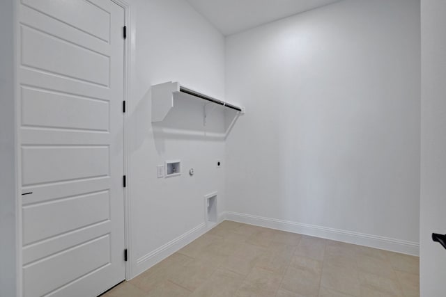 laundry room with hookup for a washing machine, light tile patterned floors, hookup for a gas dryer, and electric dryer hookup