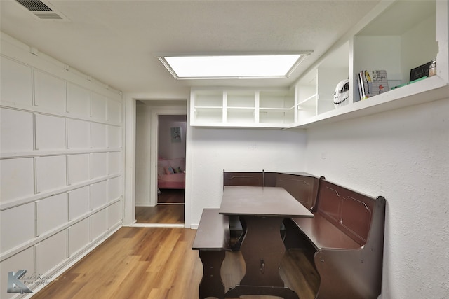 dining area featuring light wood-type flooring