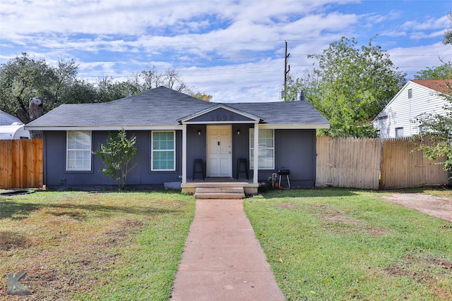 ranch-style home with a front yard