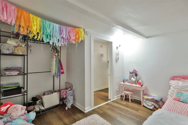 bedroom featuring hardwood / wood-style floors