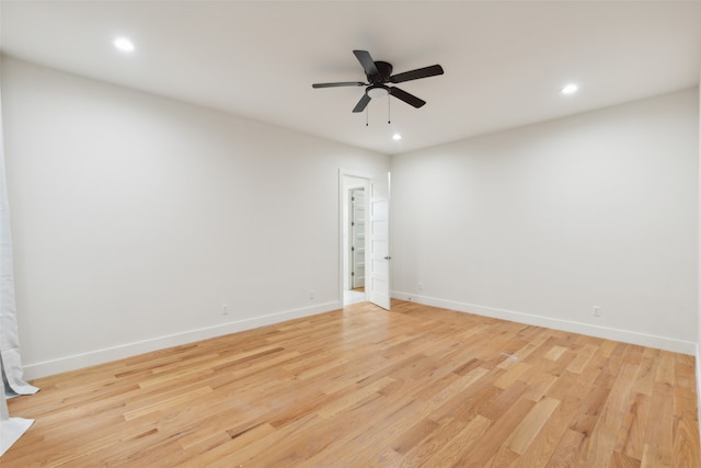 unfurnished room featuring light hardwood / wood-style flooring and ceiling fan