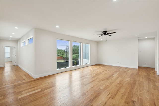 empty room featuring light hardwood / wood-style floors and ceiling fan