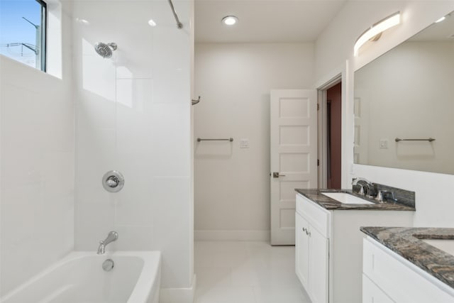 bathroom featuring tile patterned flooring, vanity, and shower / bathing tub combination