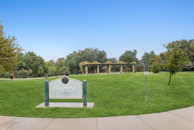 view of home's community featuring a lawn