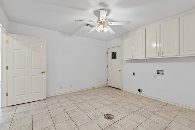 laundry room featuring hookup for a washing machine, cabinets, ceiling fan, and light tile patterned floors