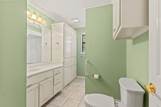 bathroom with tile patterned floors, vanity, toilet, and crown molding