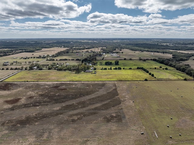 birds eye view of property featuring a rural view