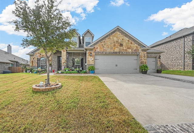 view of front facade featuring a garage, central air condition unit, and a front lawn