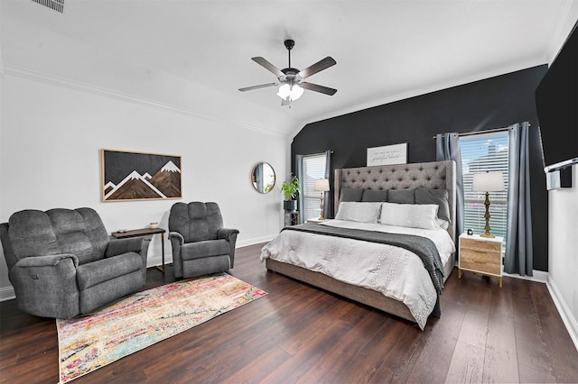 bedroom featuring dark hardwood / wood-style flooring, crown molding, lofted ceiling, and ceiling fan