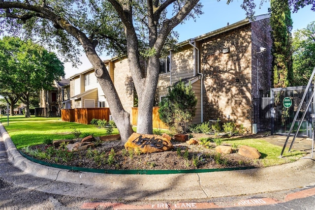 4748 Old Bent Tree Ln Unit 1104, Dallas, TX 75287 - view of property exterior featuring brick siding