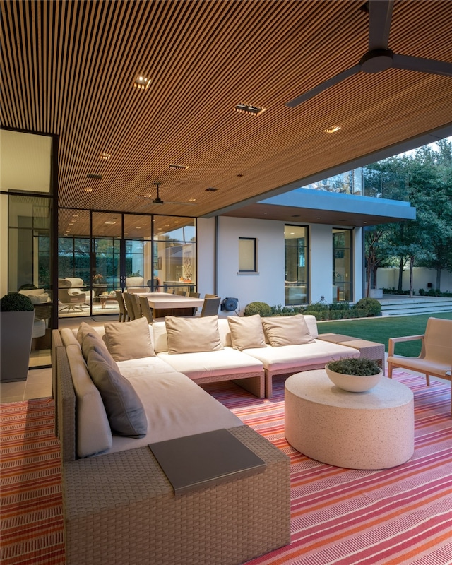 view of patio / terrace featuring ceiling fan and an outdoor hangout area