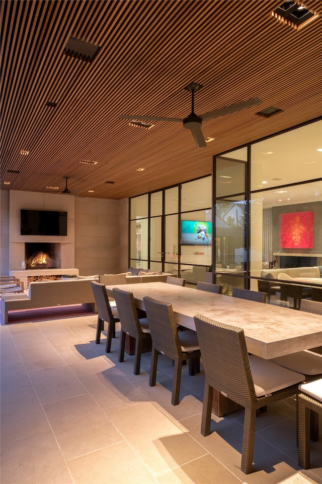 interior space with an outdoor fireplace