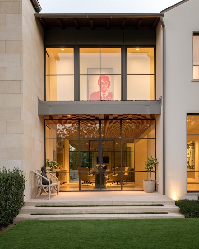 rear view of house featuring a patio area