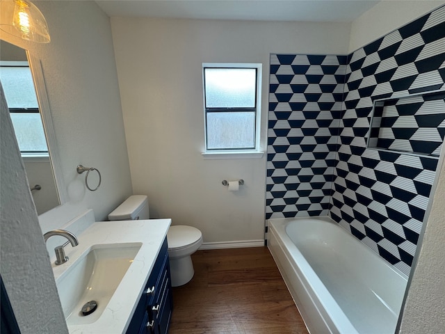 full bathroom featuring wood-type flooring, toilet, separate shower and tub, and vanity