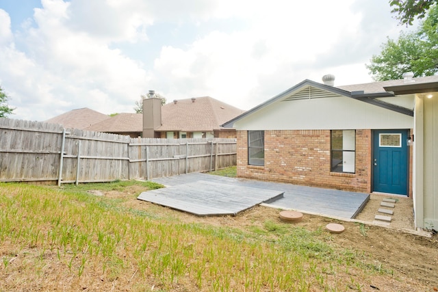 view of yard with a deck