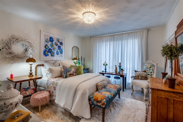 bedroom featuring light hardwood / wood-style floors