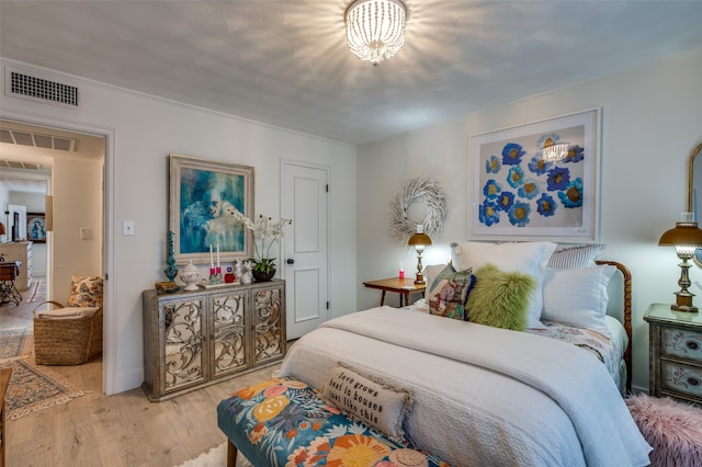 bedroom with light wood-type flooring