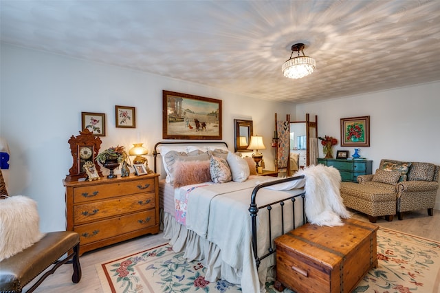 bedroom featuring light wood-type flooring