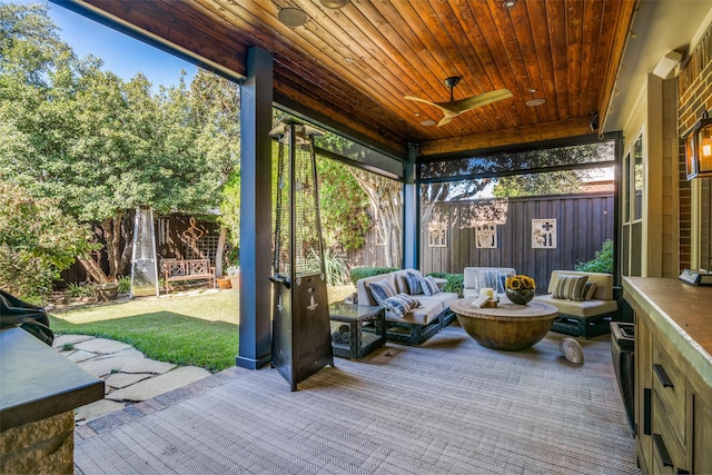 7009 Sharps Dr, Plano, TX 75025 - sunroom with an outdoor hangout area, a ceiling fan, and healthy amount of natural light