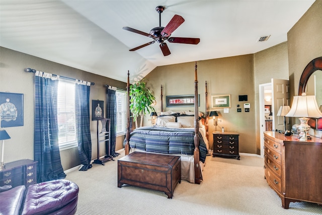 carpeted bedroom featuring vaulted ceiling and ceiling fan