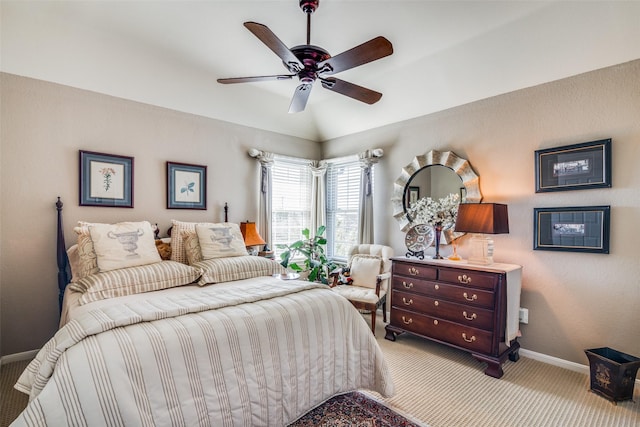 7009 Sharps Dr, Plano, TX 75025 - carpeted bedroom with baseboards, vaulted ceiling, and a ceiling fan