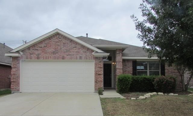 single story home with a garage