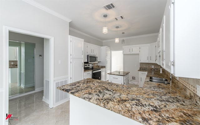 kitchen with tasteful backsplash, stone counters, kitchen peninsula, and stainless steel appliances