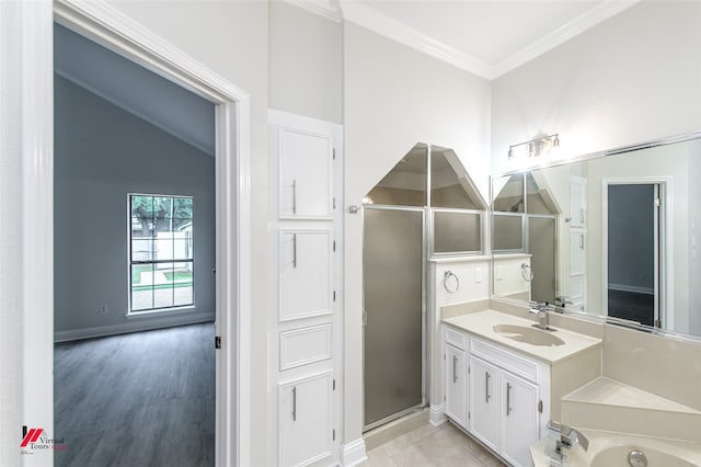 bathroom featuring shower with separate bathtub, wood-type flooring, vaulted ceiling, vanity, and crown molding