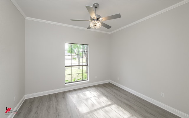 unfurnished room with light hardwood / wood-style floors, ceiling fan, and ornamental molding