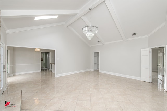 unfurnished living room featuring beam ceiling, a skylight, high vaulted ceiling, and a notable chandelier