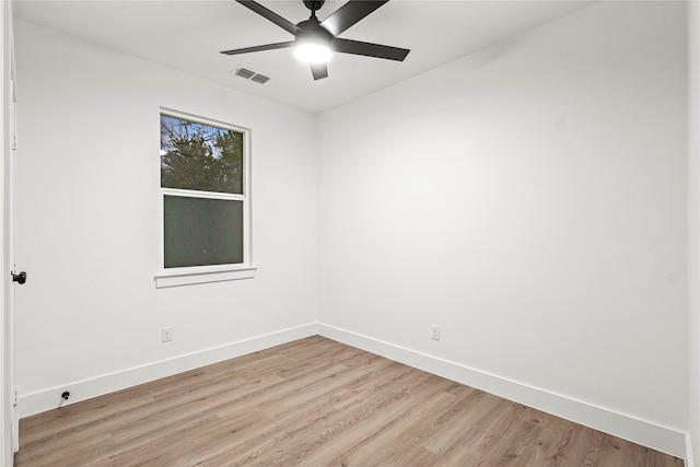 unfurnished room with ceiling fan and light hardwood / wood-style floors