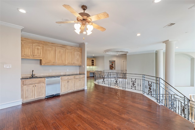 kitchen featuring ornamental molding, light brown cabinetry, dark hardwood / wood-style flooring, decorative columns, and dishwasher