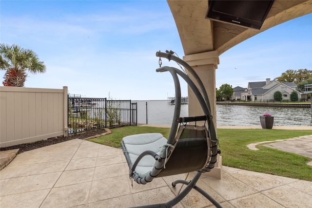 view of patio featuring a water view