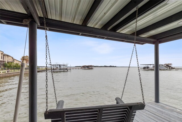 view of patio / terrace with a water view